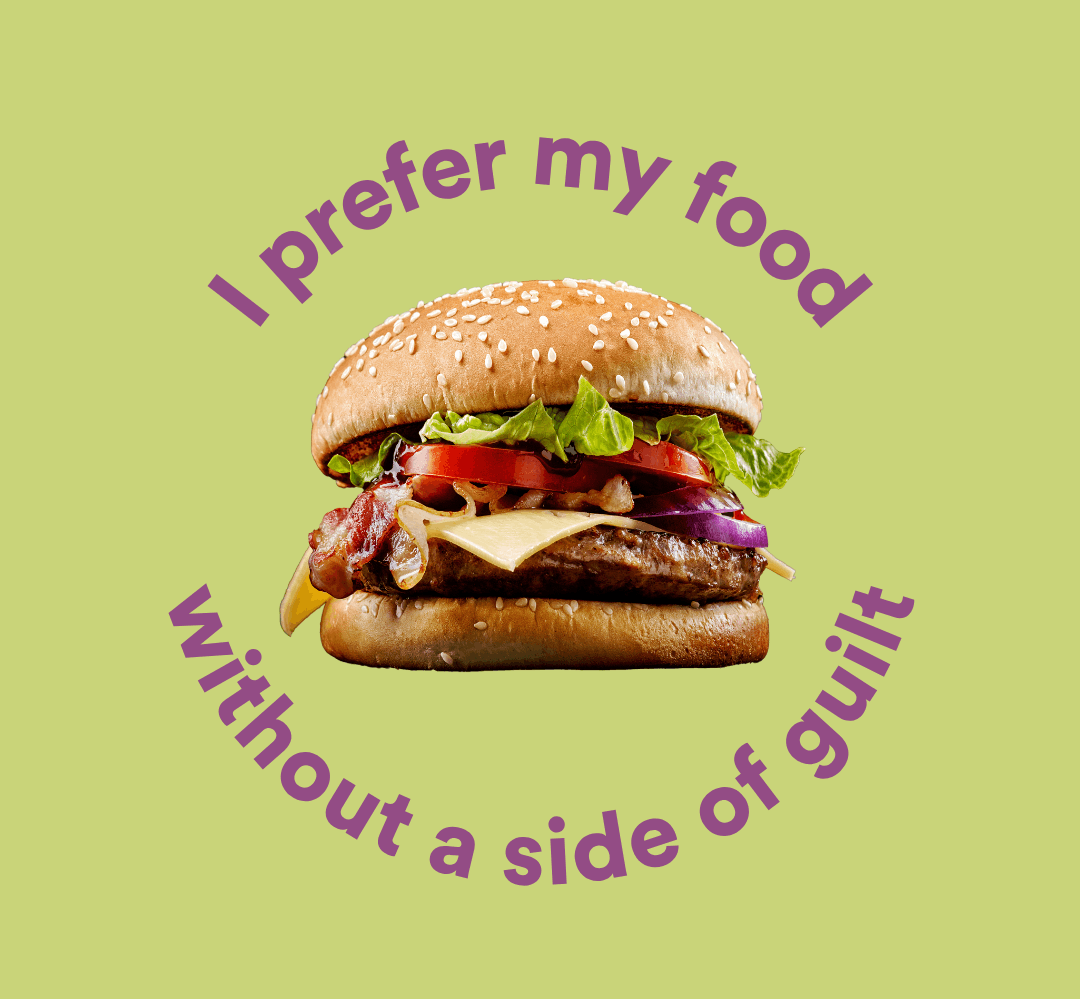 A cheeseburger with lettuce, tomato, onion, cheese, bacon, and a beef patty inside a sesame seed bun, with the text 'I prefer my food without a side of guilt' surrounding it on a light green background.