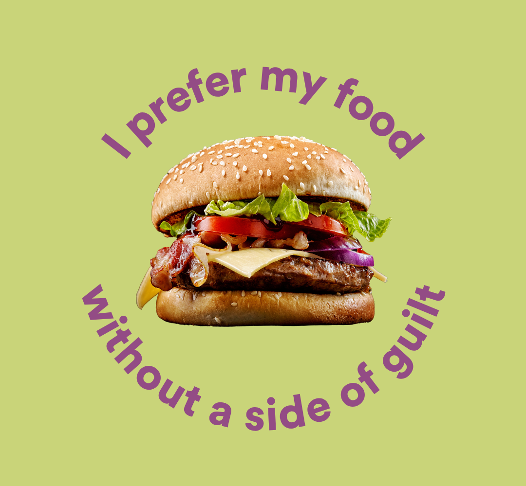 A hamburger with lettuce, tomato, cheese, bacon, onion, and beef patty on a sesame seed bun, with purple text above and below that reads, "I prefer my food without a side of guilt."