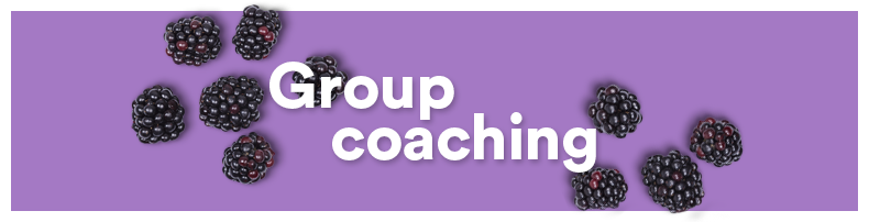 Blackberry fruits scattered around the words 'Group coaching' on a purple background.