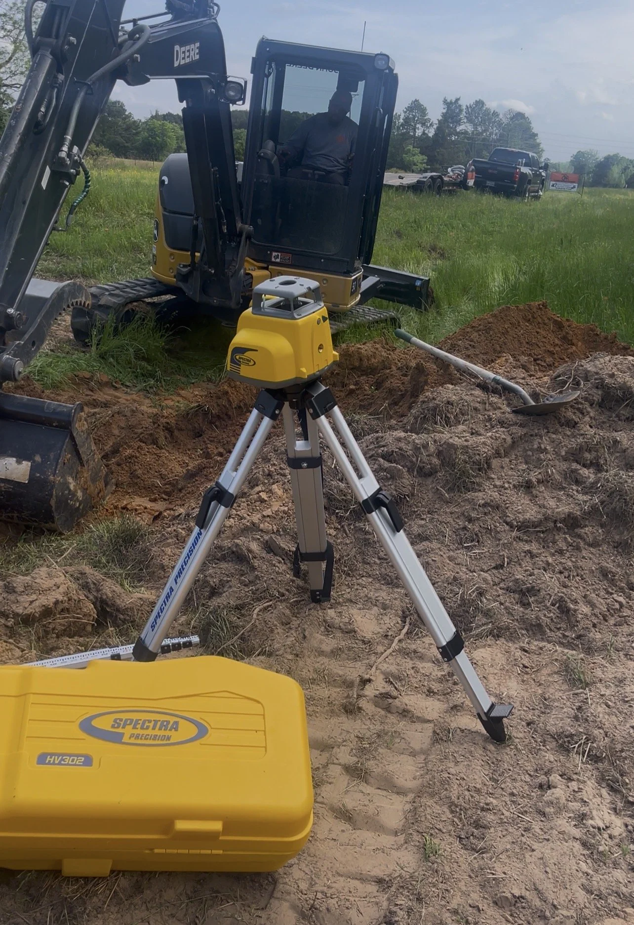 Excavator and laser 