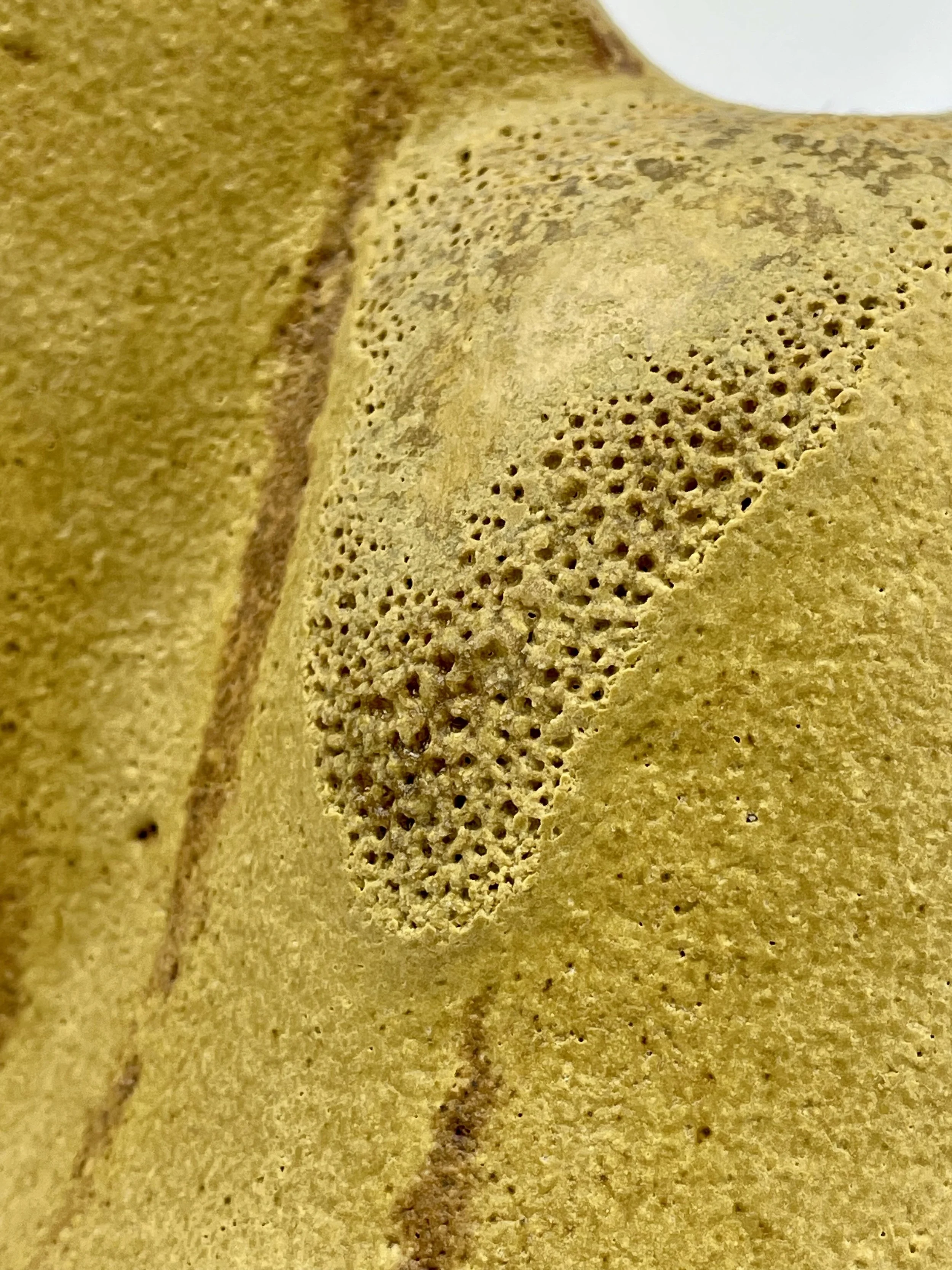 Untitled, 2025, brown clay, glaze, 22 x 17 x 17 cm