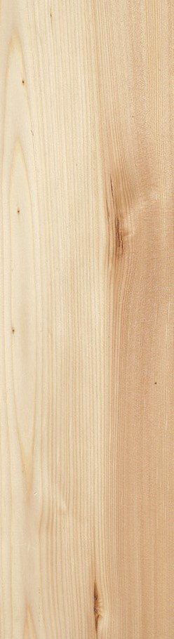 Superficie de madera clara con vetas y nudos naturales.