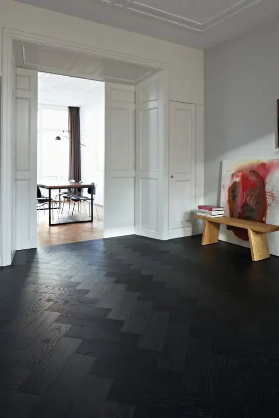 02-black-patterned-wooden-floor-for-an-entryway.webp