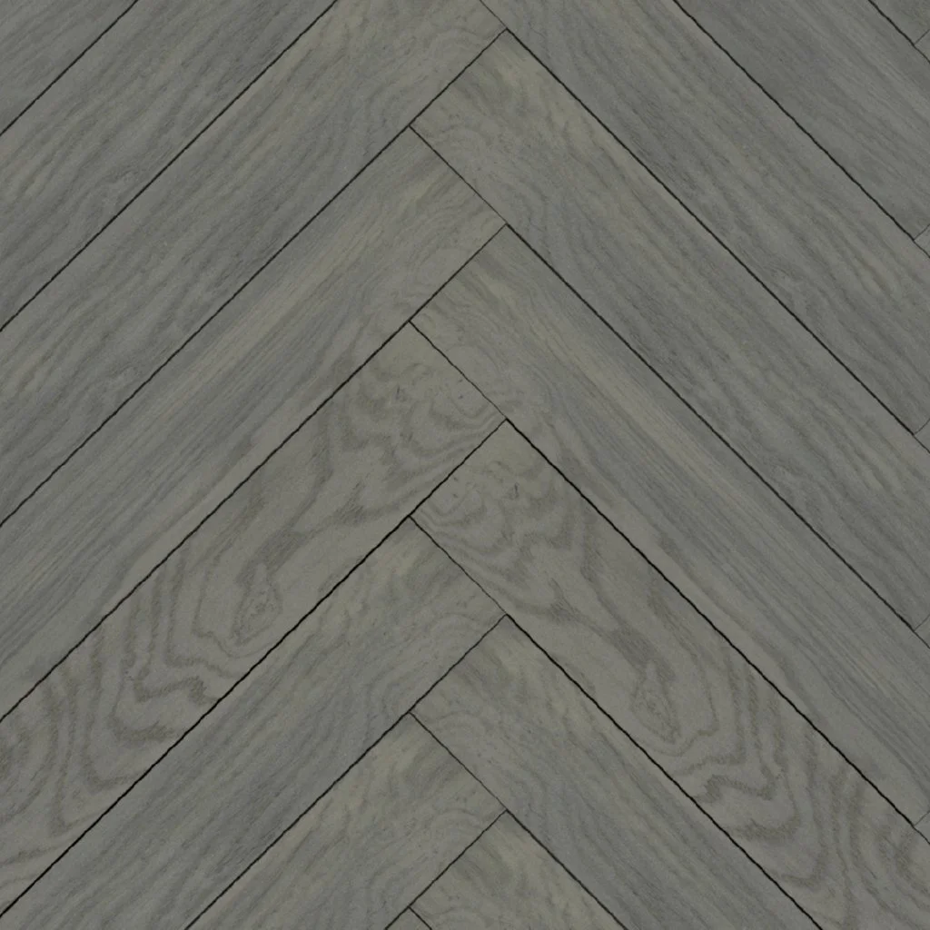 Suelo de madera en patrón en espiga, tonalidad gris.