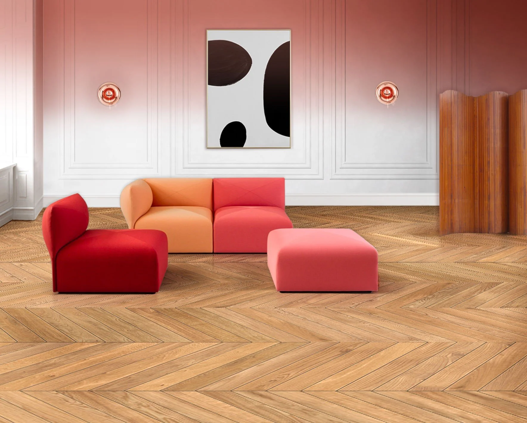 Sala moderna con sillones en tonos rojos, durazno y rosa, arte abstracto en la pared y piso de parquet.