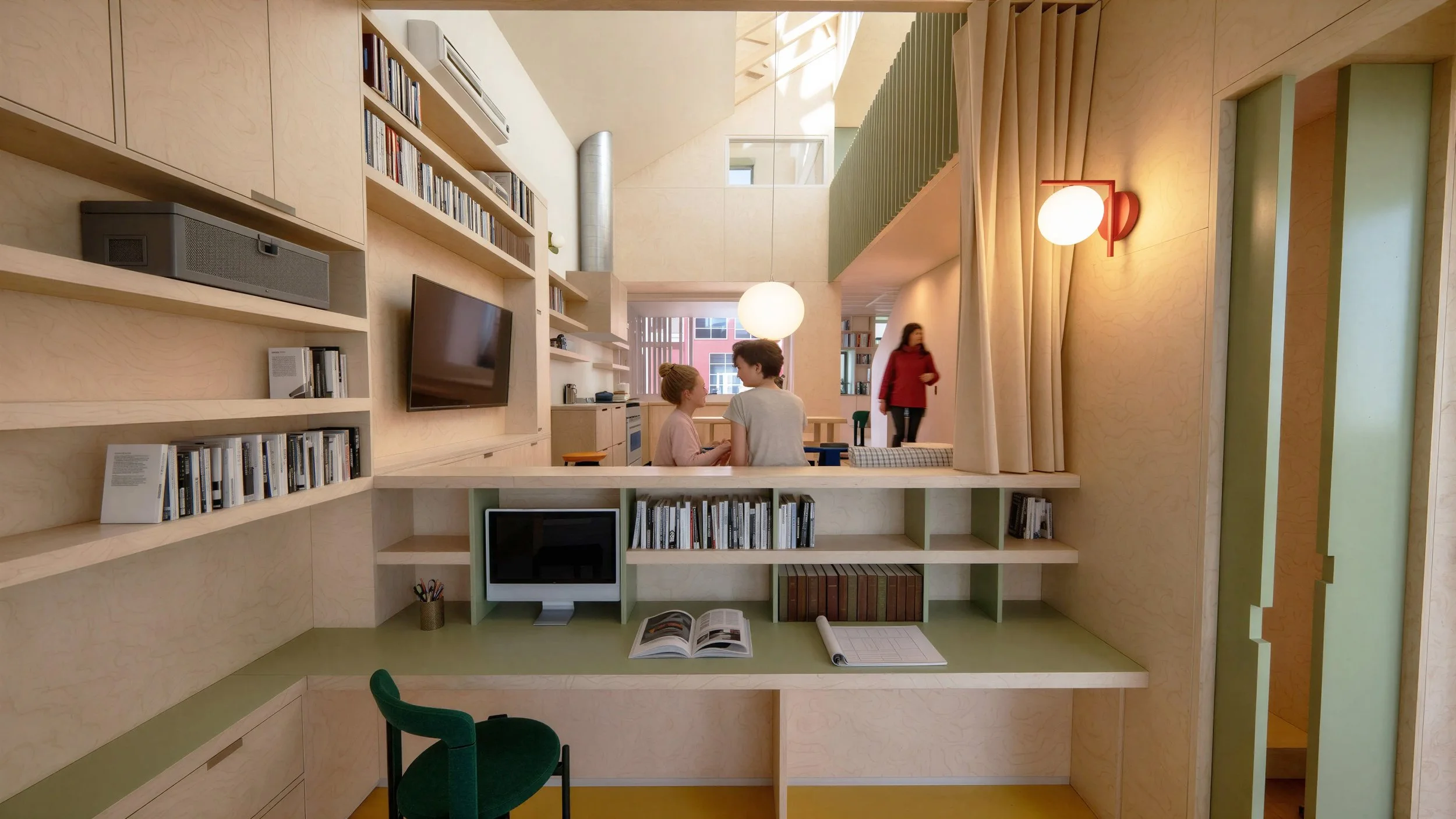 An image of the interior of a contemporary scandivanian rowhouse with baltic birch plywood, and soft sage green colors. Artek Furniture. HAY furniture. Nashville Designer.