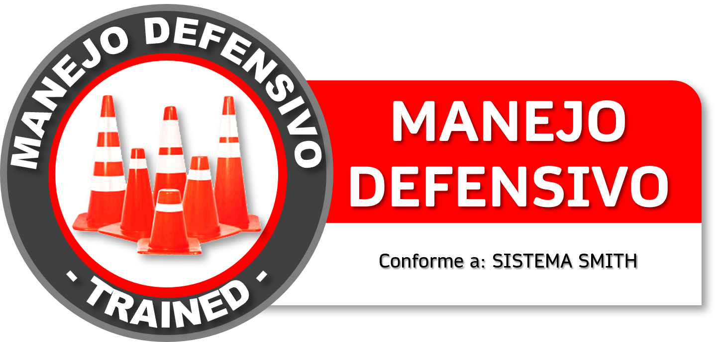 Señal de advertencia de manejo defensivo con conos naranjas y blancas y texto en español que dice 'Manejo Defensivo, Conforme a Sistema Smith' Curso GRETNER DC3