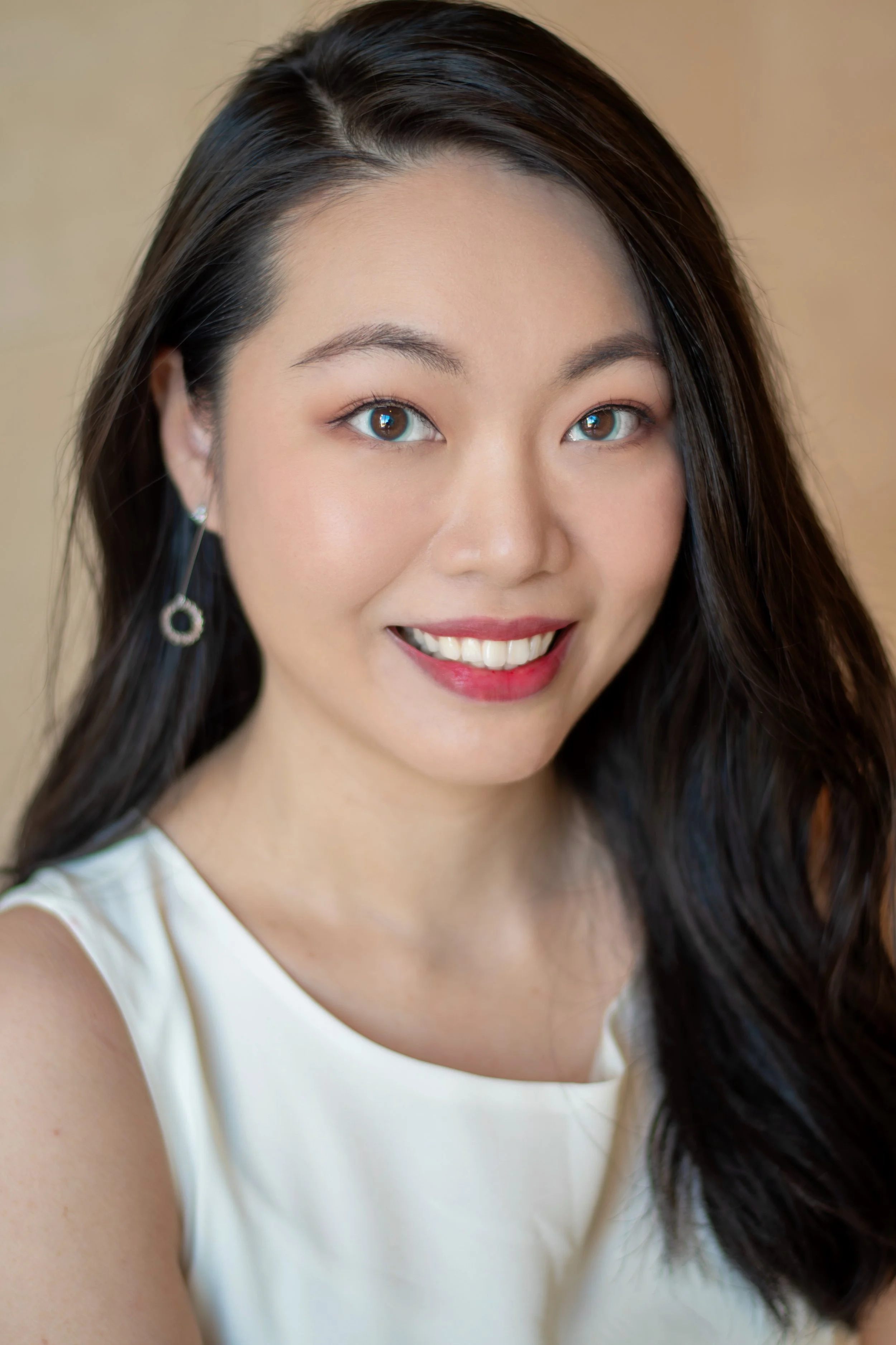 Meet Dr. Jung-An Chou, Taiwanese soprano, voice teacher, and choral conductor offering personalized voice lessons at VOCES in Garland, Texas.
