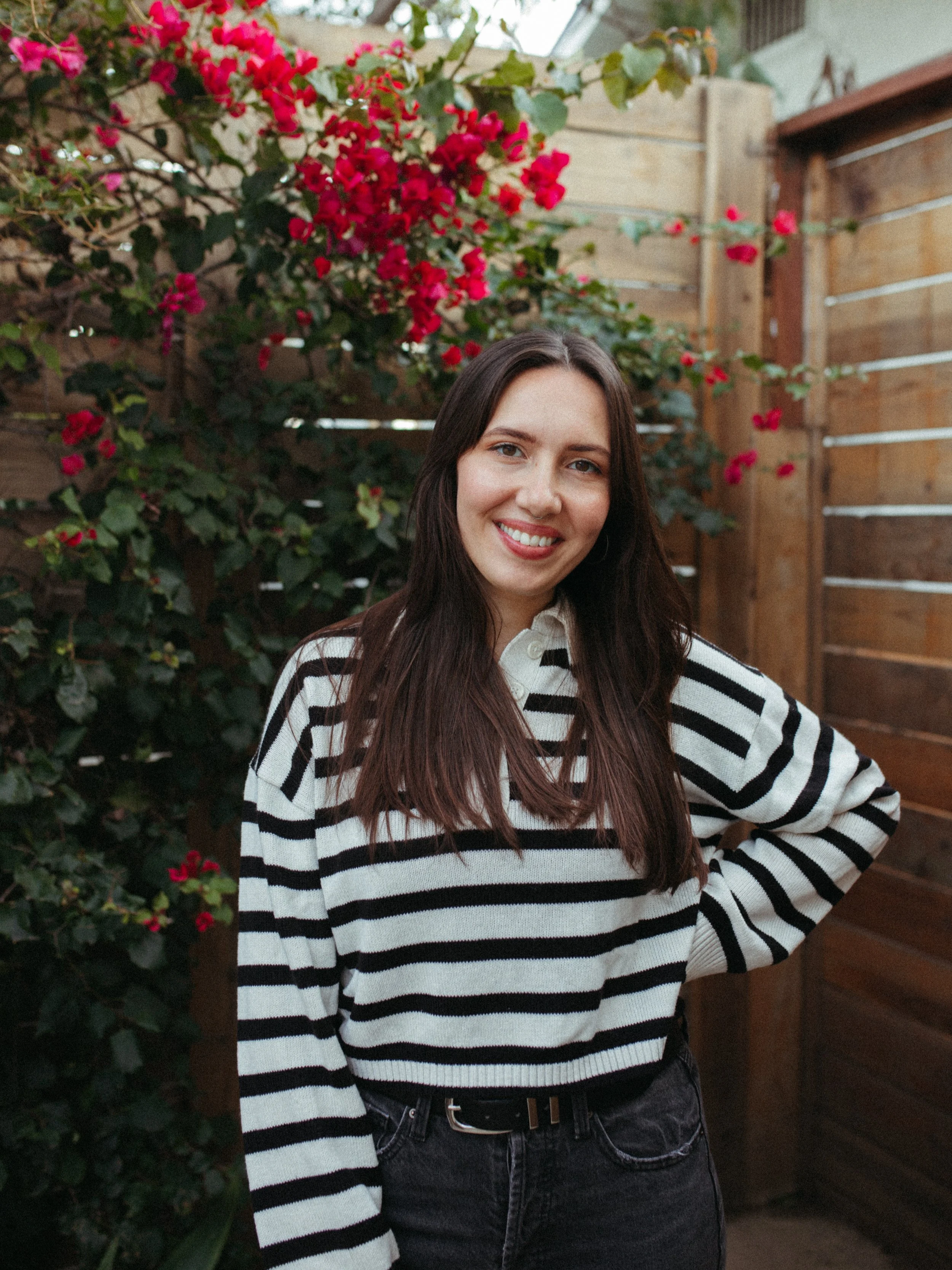 A woman with long dark hair smiling. I support ex mormon therapy, ex lds therapy, and exvangelical trauma therapy for adults navigating religious trauma therapy, church hurt therapy, and faith deconstruction therapy.