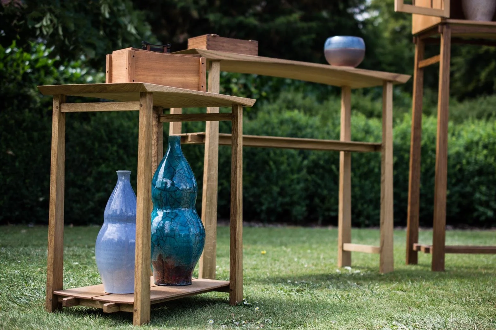 Blue raku-glazed pottery after undergoing ceramics conservation. Mended broken ceramics repaired by Derrin Compton Conservation LLC in San Francisco, CA. Bay area ceramics conservation studio specializing in objects, art and sculpture restoration.