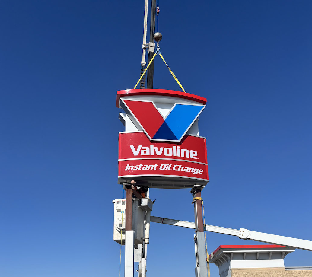 Process of a pylon sign being installed in Kentucky for Valvoline.