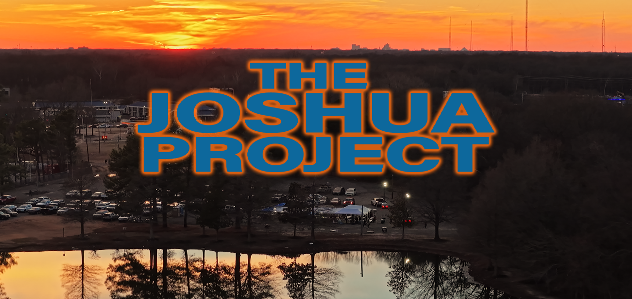 Sunset over a park with a pond, trees, and a parking lot, with the text 'The Joshua Project' overlayed in large blue and orange letters.