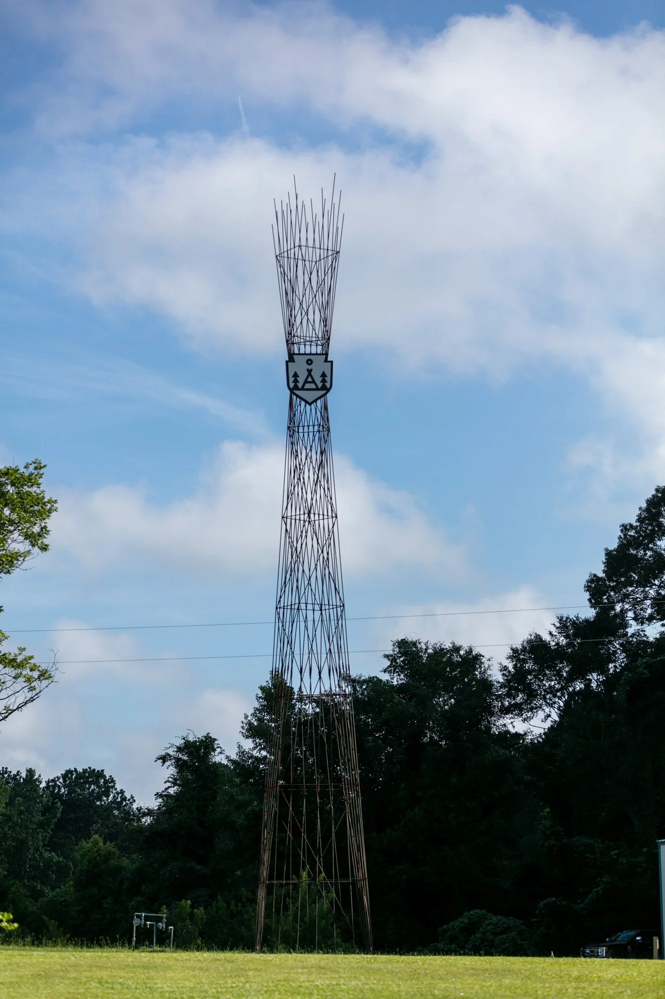 "The Tower", 75' tall tower signals from far away that the camp was near, designed to generate excitement before the kids arrived. Made entirely of recycled materials.