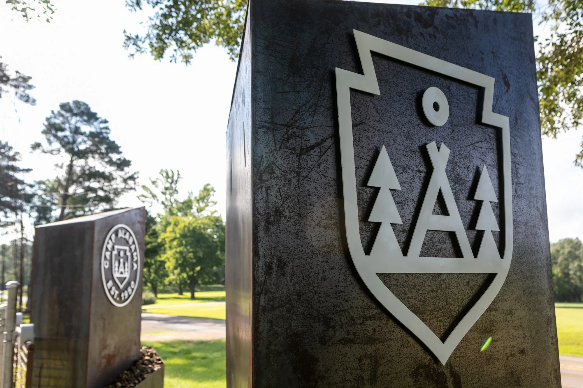 Front gate, two 800 lb pylons with remote operated electric gate.