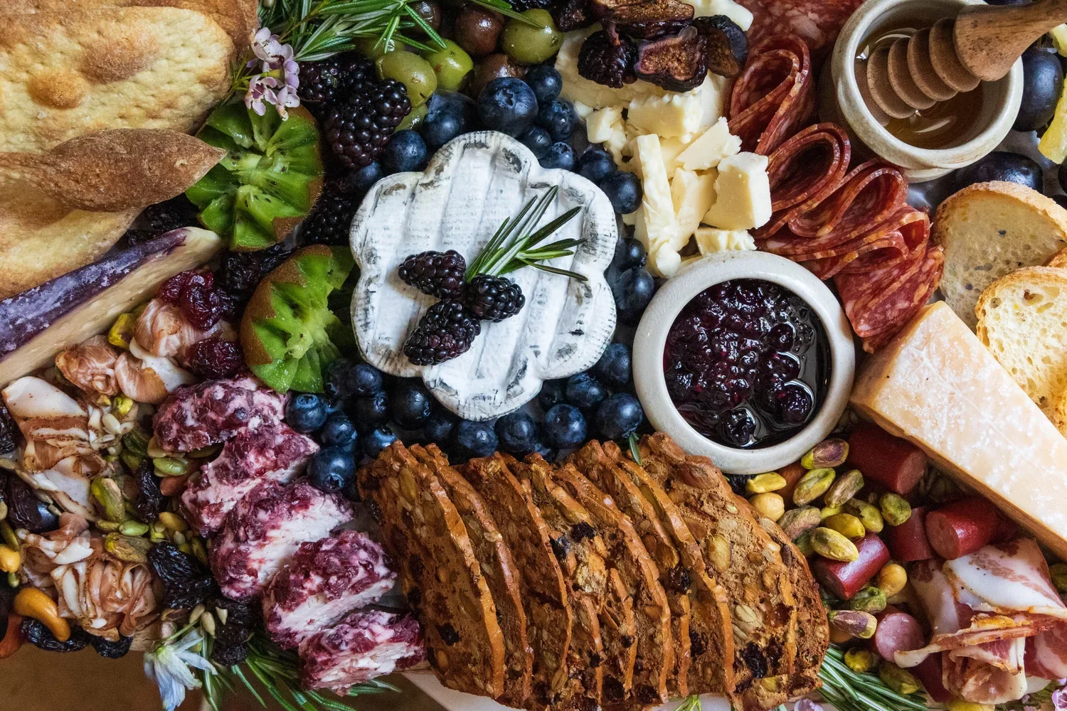 Chi-cuterie - A hidden gem.  Outdoor patio, little charcuterie boards (or big ones) and live music all summer long. Oh, and WINE!