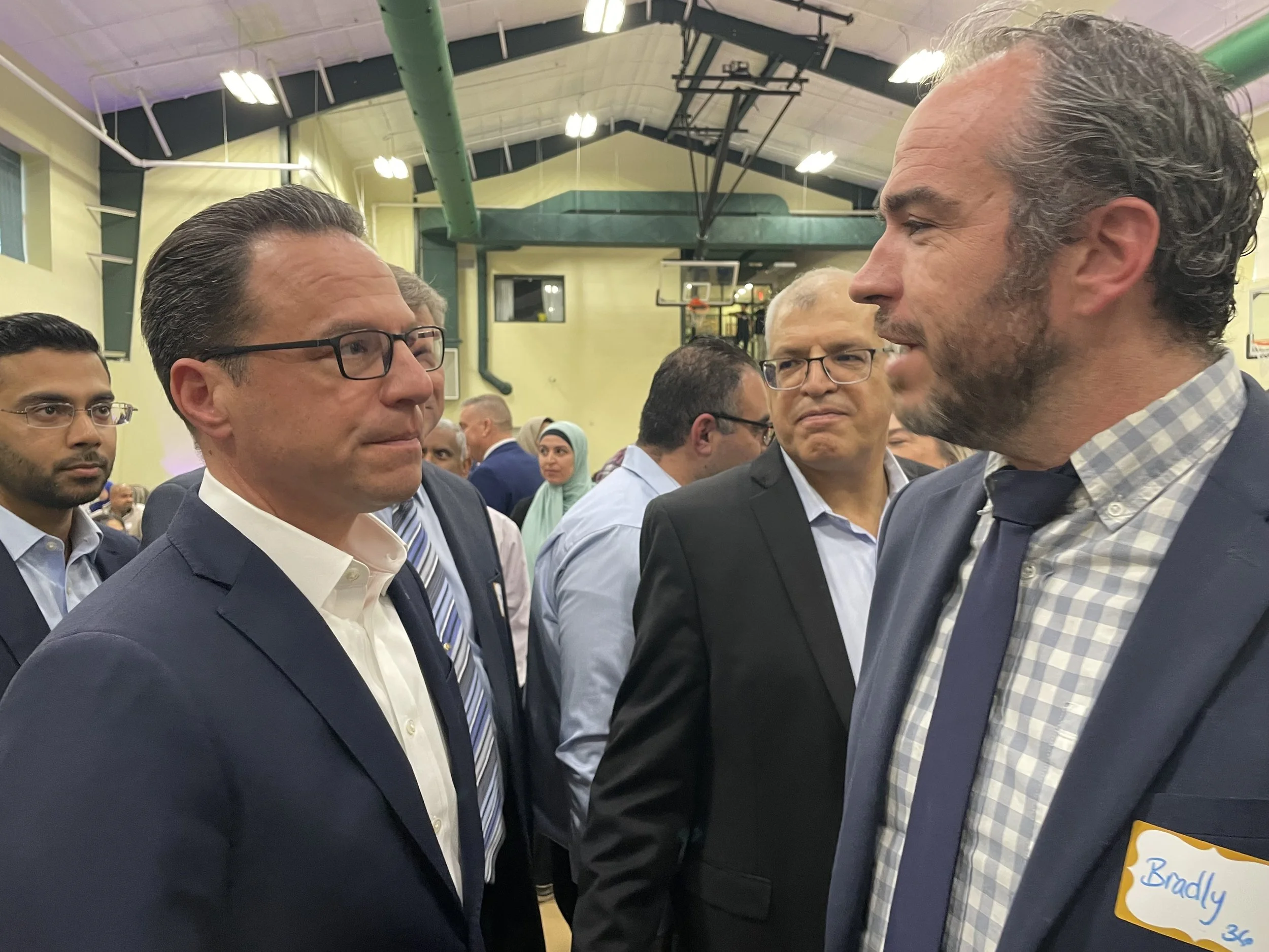 Pennsylvania senate candidate Bradley Merkl-Gump, Democrat for District 16, meets with Pennsylvania governor Josh Shapiro.