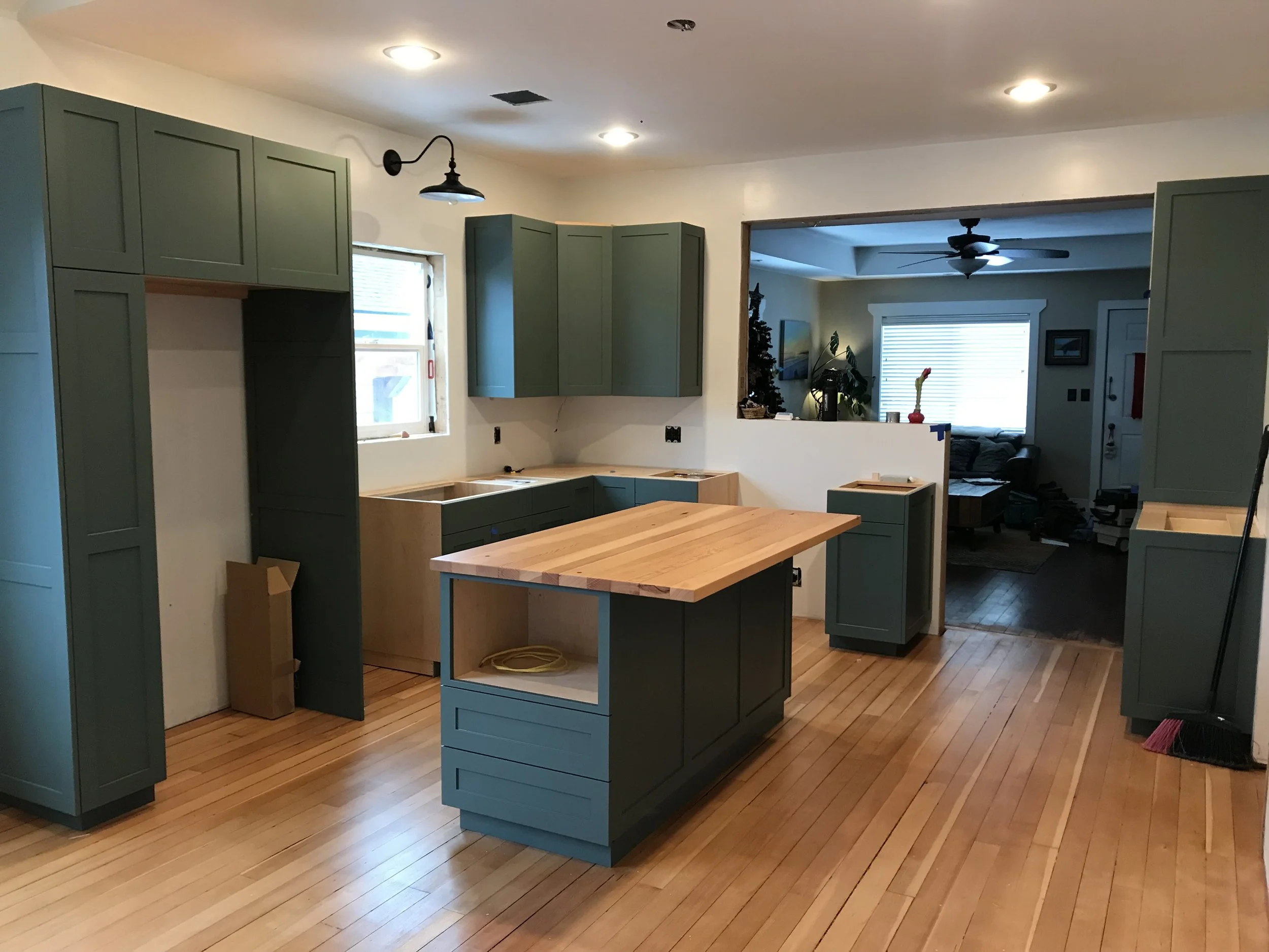 Sunnyland Kitchen in Green with Reclaimed fir island top by Carpenter Ant LLC