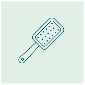 Illustration of a body scrub brush with a handle and a rectangular scrub pad.
