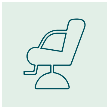 Simple illustration of a salon or barber chair on a light green background.