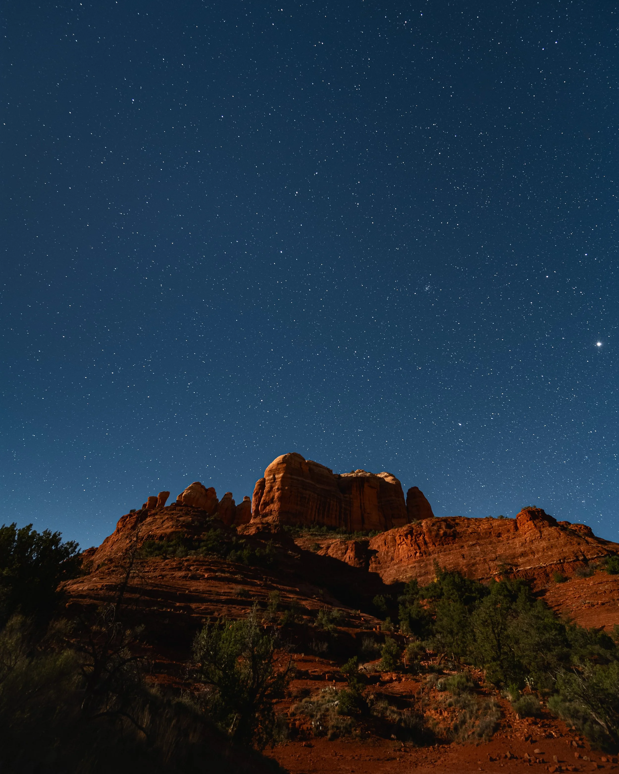Finding Light

Cathedral Rock under a clear, star-filled sky in Sedona, Arizona.