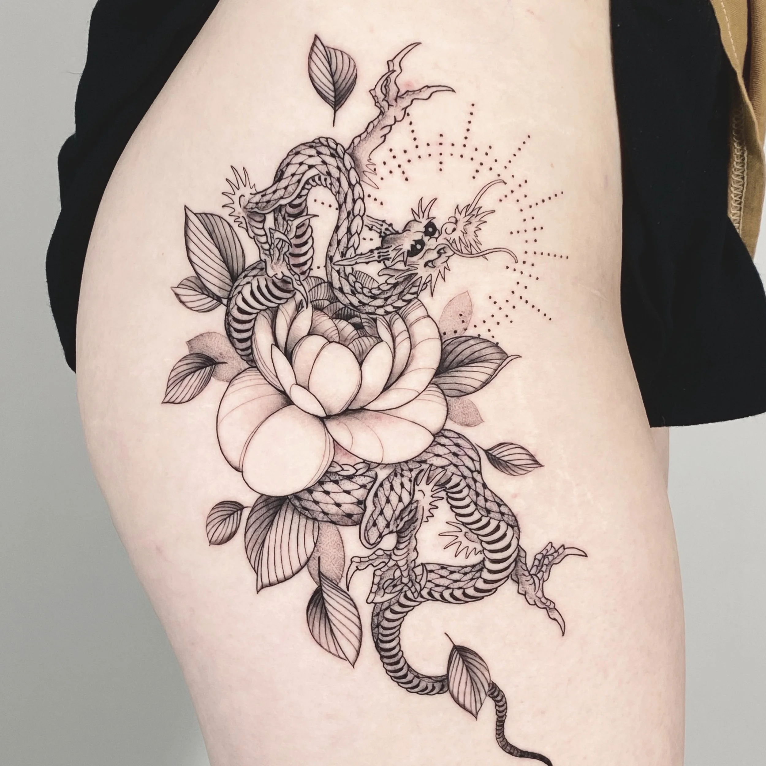 Fine line dragon tattoo 