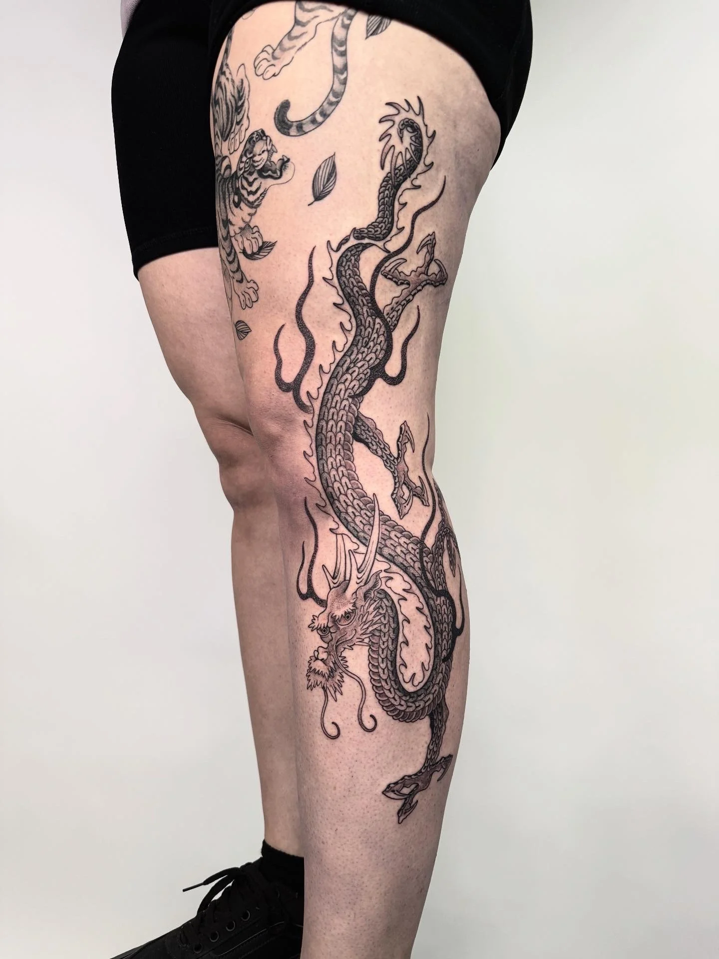 Ornamental Asian dragon tattoo