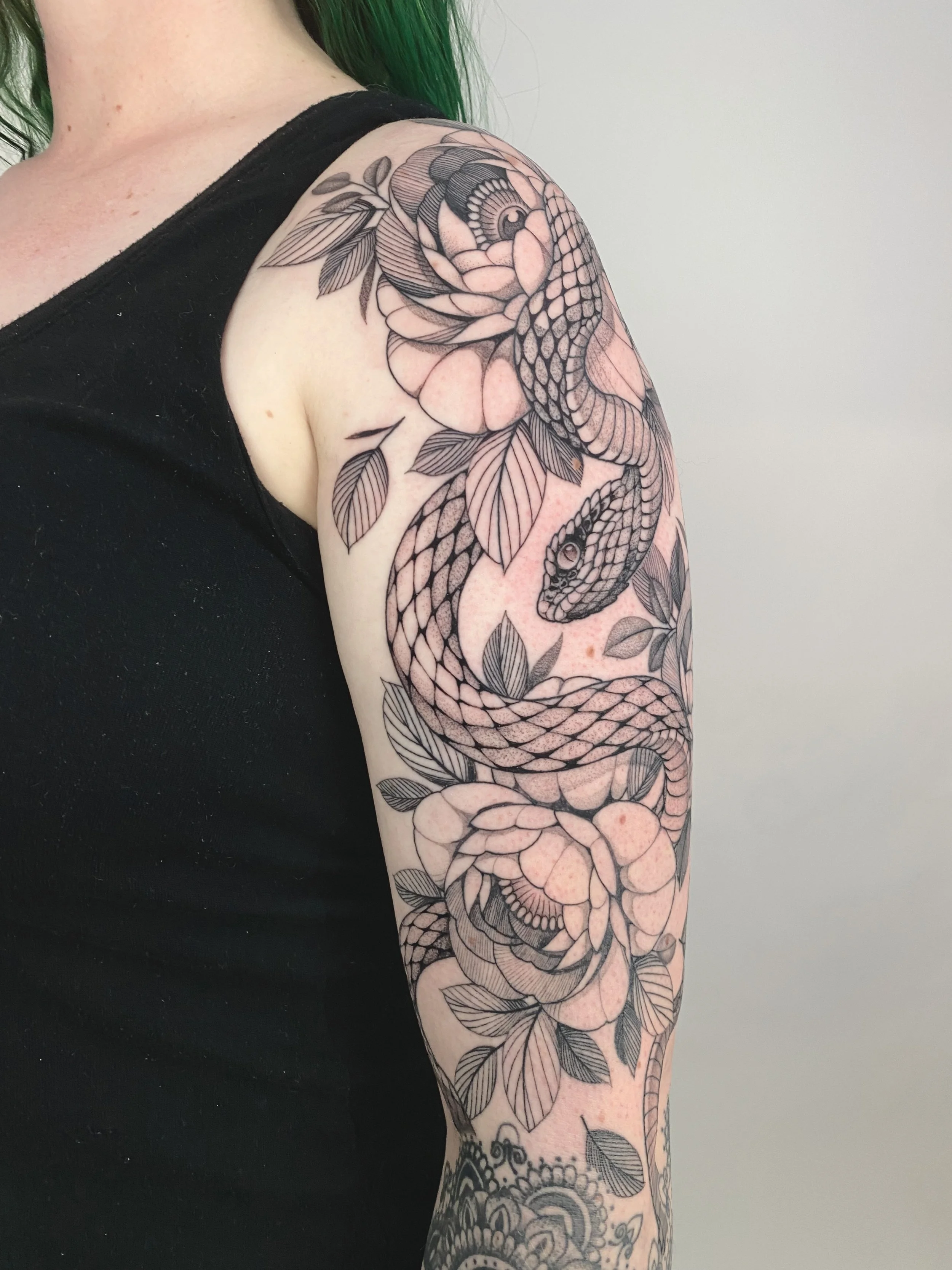 snake tattoo , peonies tattoo , sleeve tattoo , feminine tattoo ides , denver tattoo