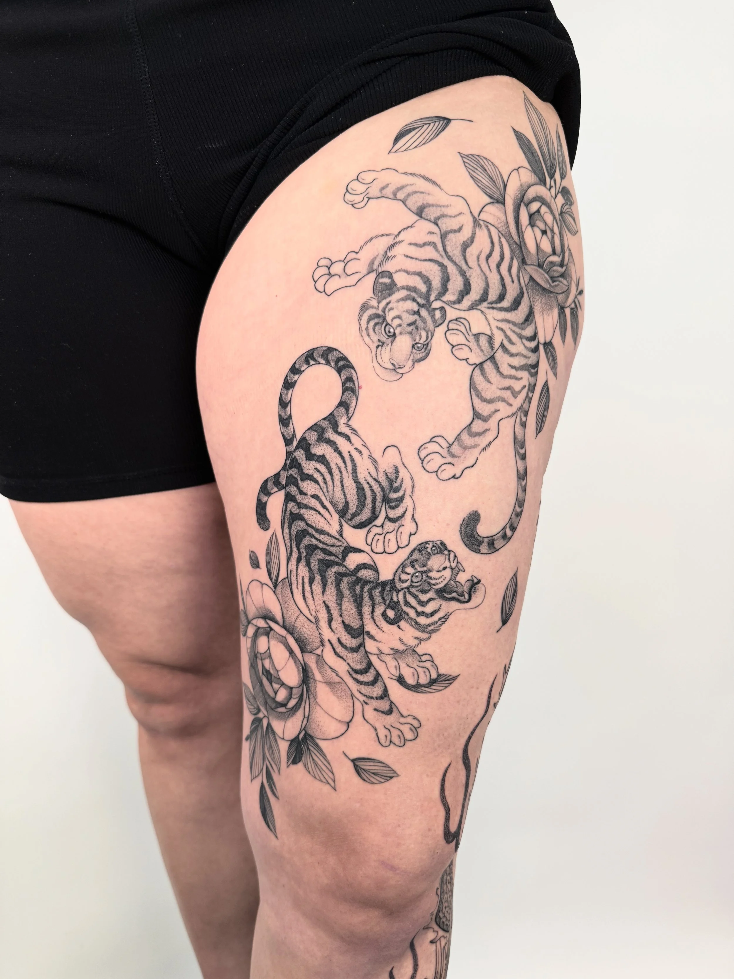 Asian black and gray Tiger tattoo 
