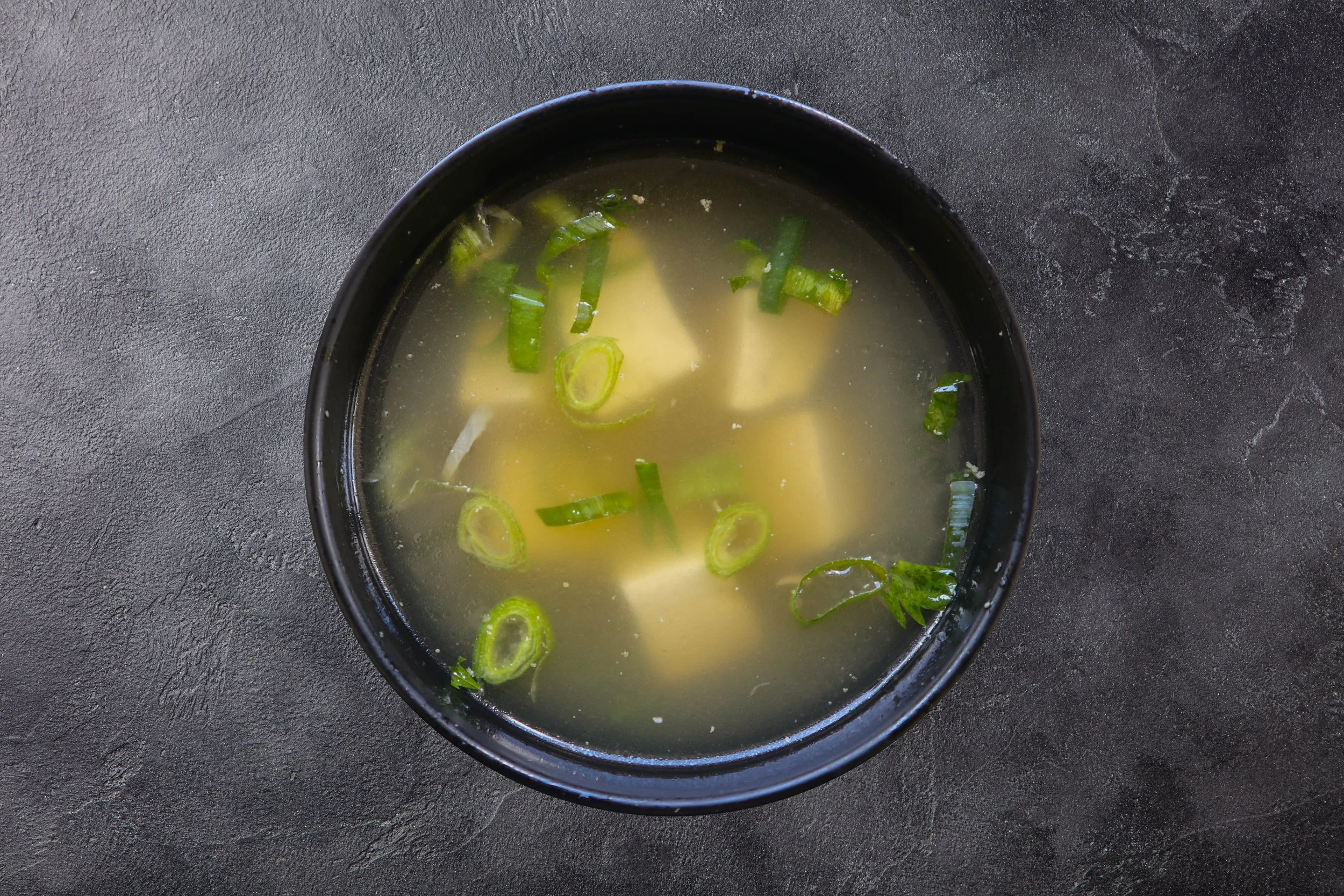 Miso soup with tofu and scallions