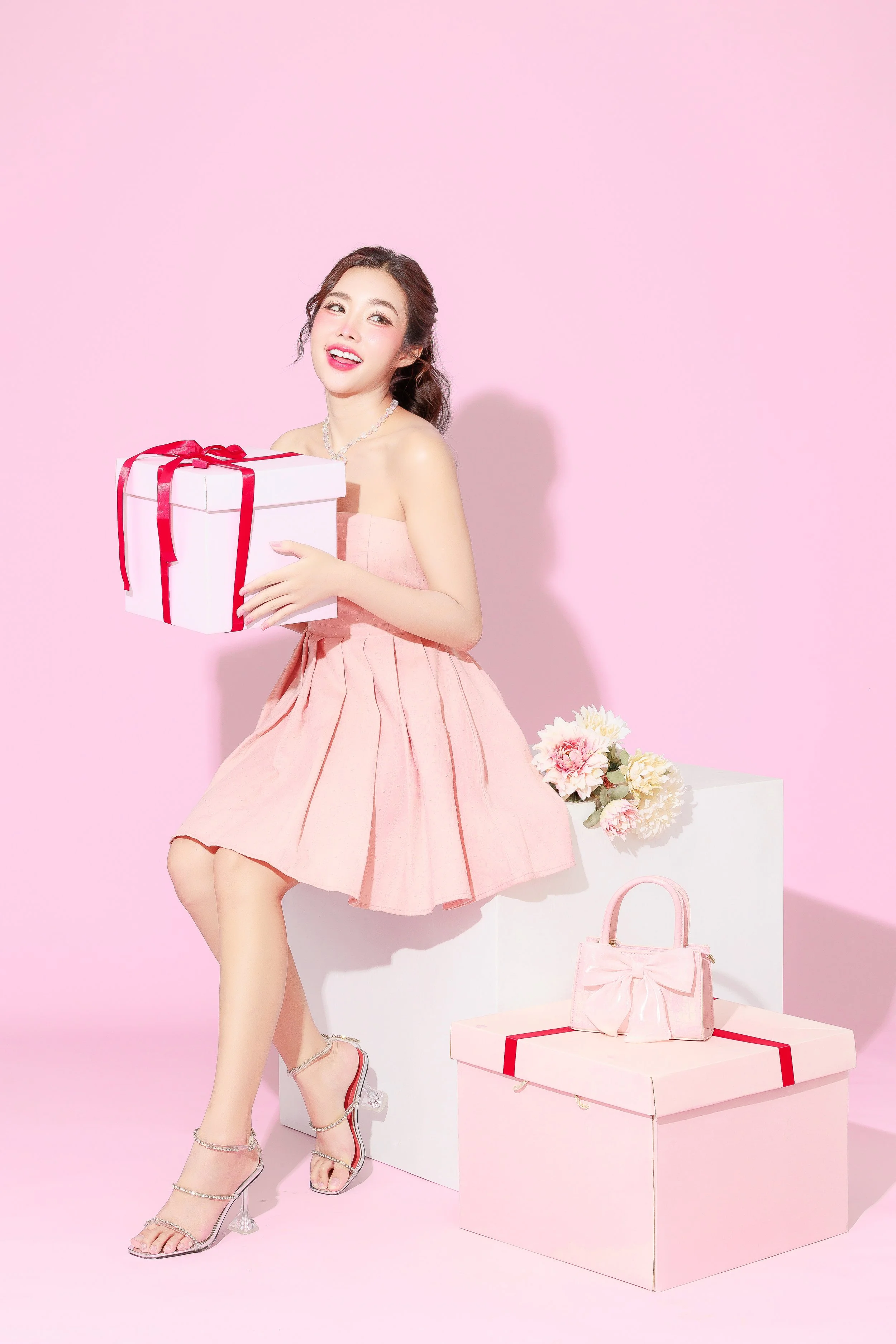 portrait-cute-asian-woman-pink-dress-gesture-feeling-surprise-happiness-with-valentine-birthday-gift-isolated-background-female-model-holding-present-boxes (3).jpg