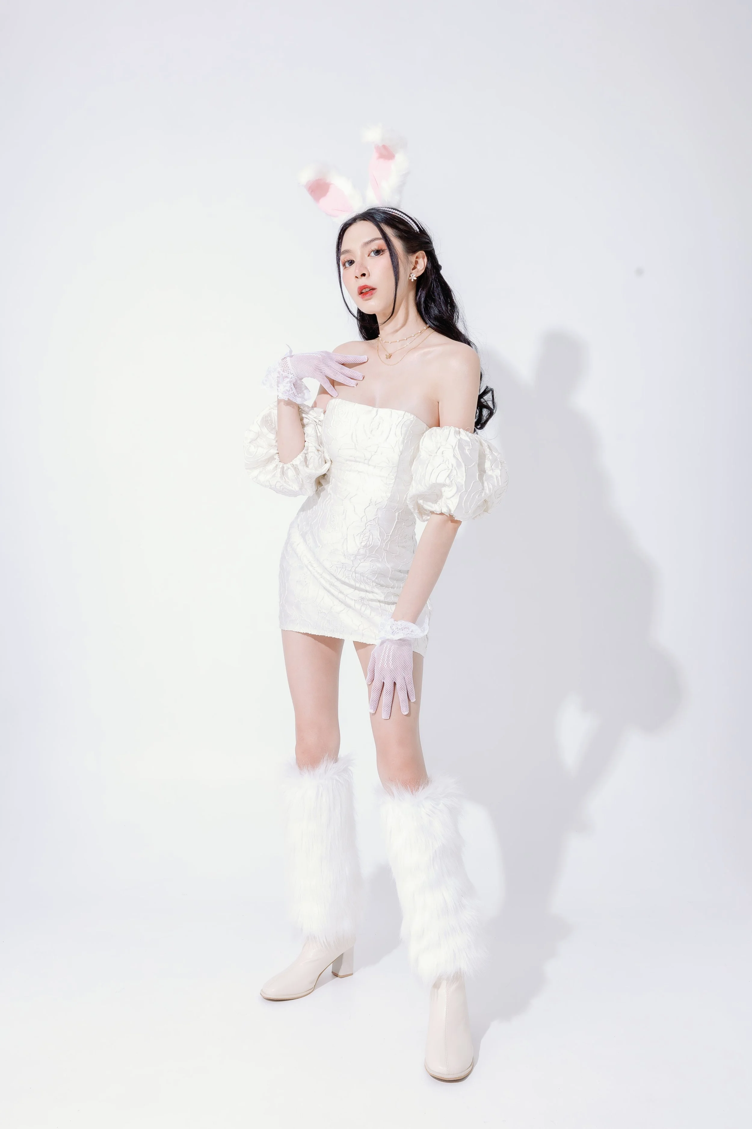 ester-festival-concept-cute-asian-woman-has-lovely-face-is-feeling-happy-have-perfect-clear-fresh-skin-slim-body-with-fluffy-bunny-ears-isolated-white-background (1).jpg