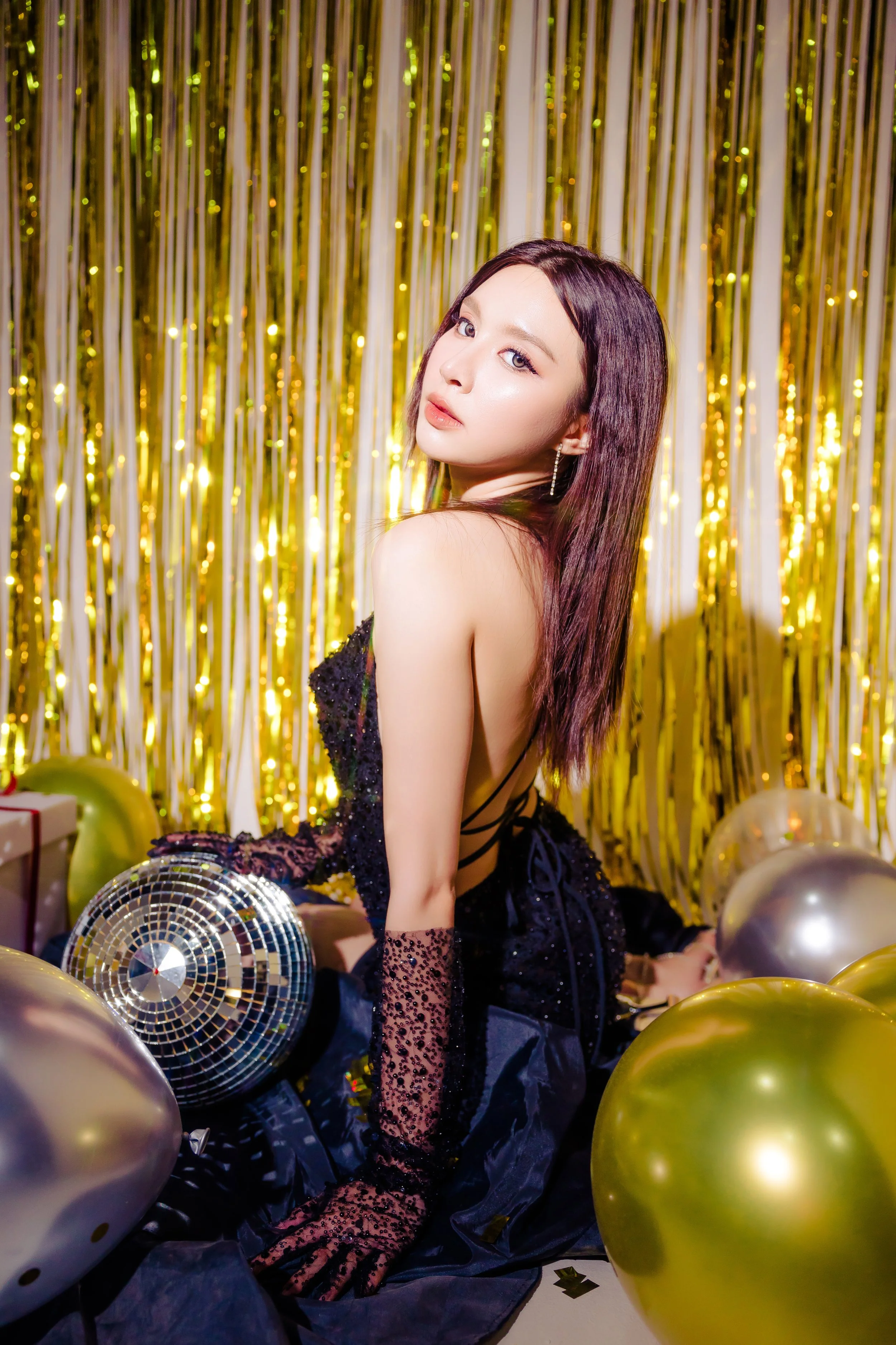 young-charming-beautiful-asian-woman-wearing-fashion-sexy-black-dress-enjoy-celebrate-party-posing-with-luxury-gift-boxes-shiny-gold-glitter-background-with-balloons-birthday-new-year-concept.jpg