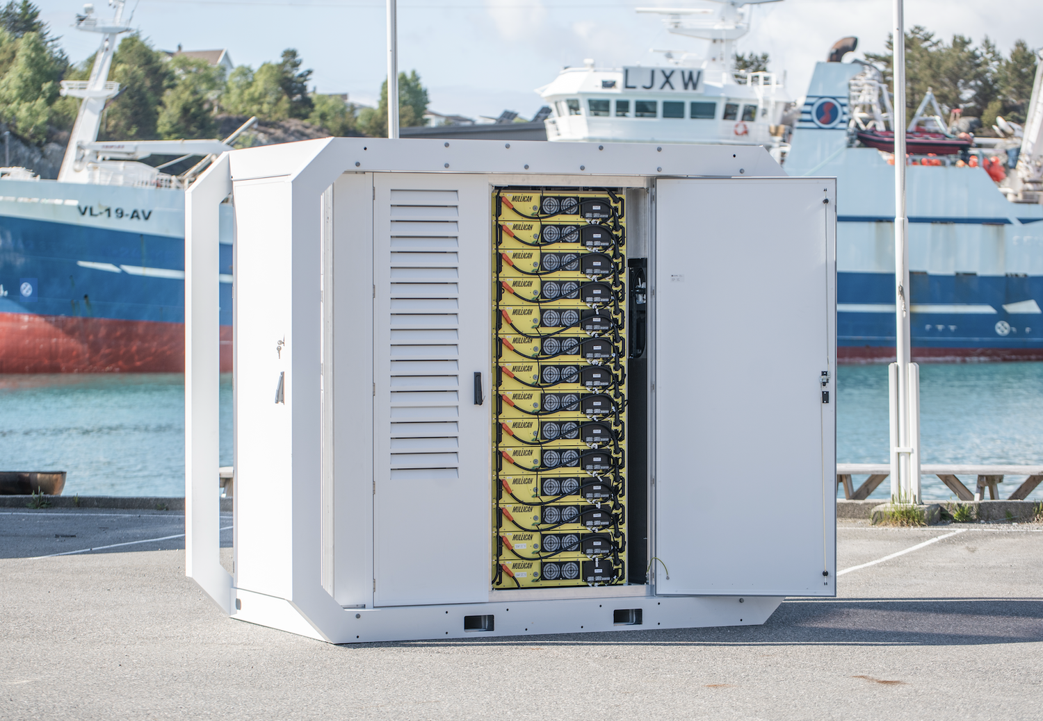 The Mulligan BESS 308 with its doors open, showing the battery modules