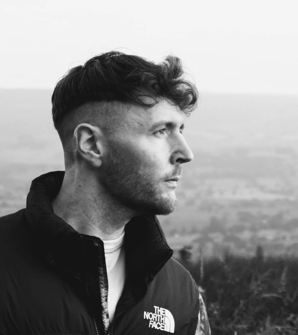 A portrait photograph of Rory Cocker