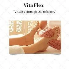 A person receiving a feet reflexology.