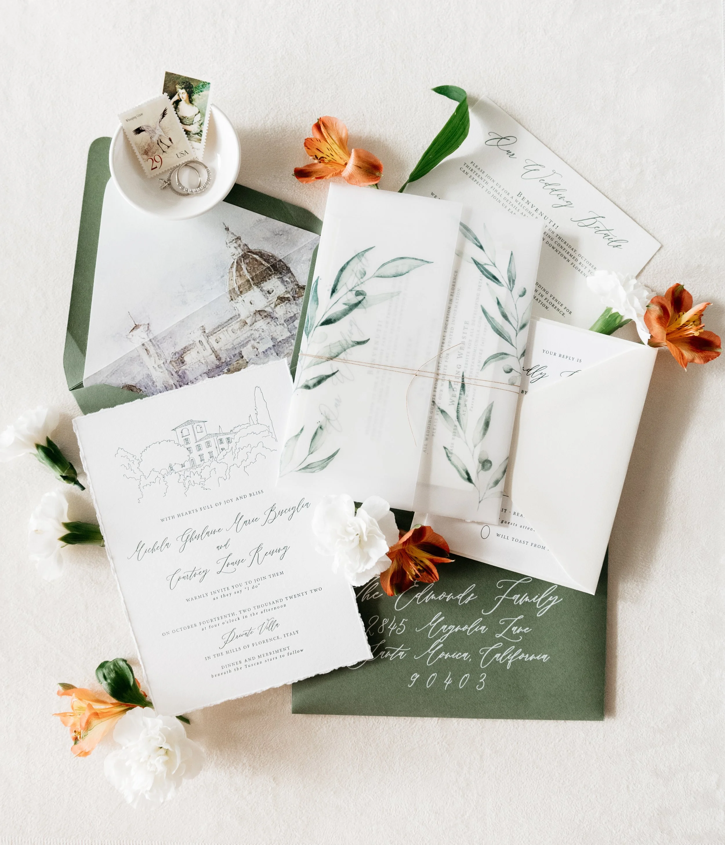 Wedding invitations and envelopes with floral decorations. Italian Wedding, destination wedding stationery