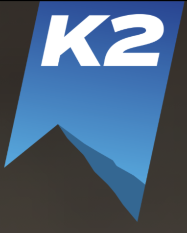 A stylized flag with the text 'K2' in large white letters on a blue background.