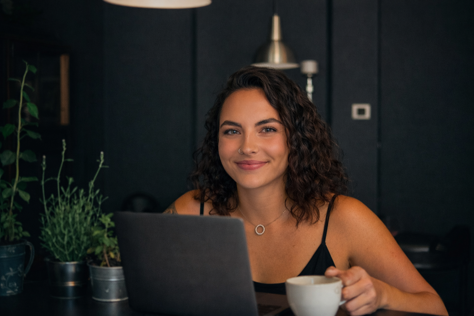 Polly working on a clients website in her office.