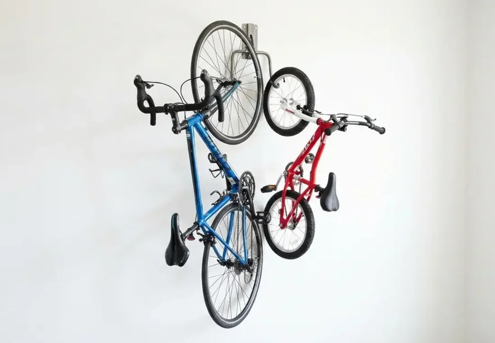 Wall mounted bike storage system in organised garage