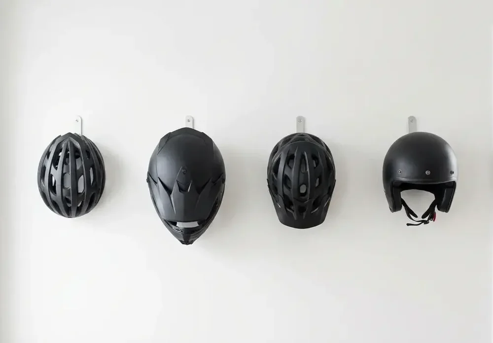 Helmet and sports gear wall storage system in organised garage