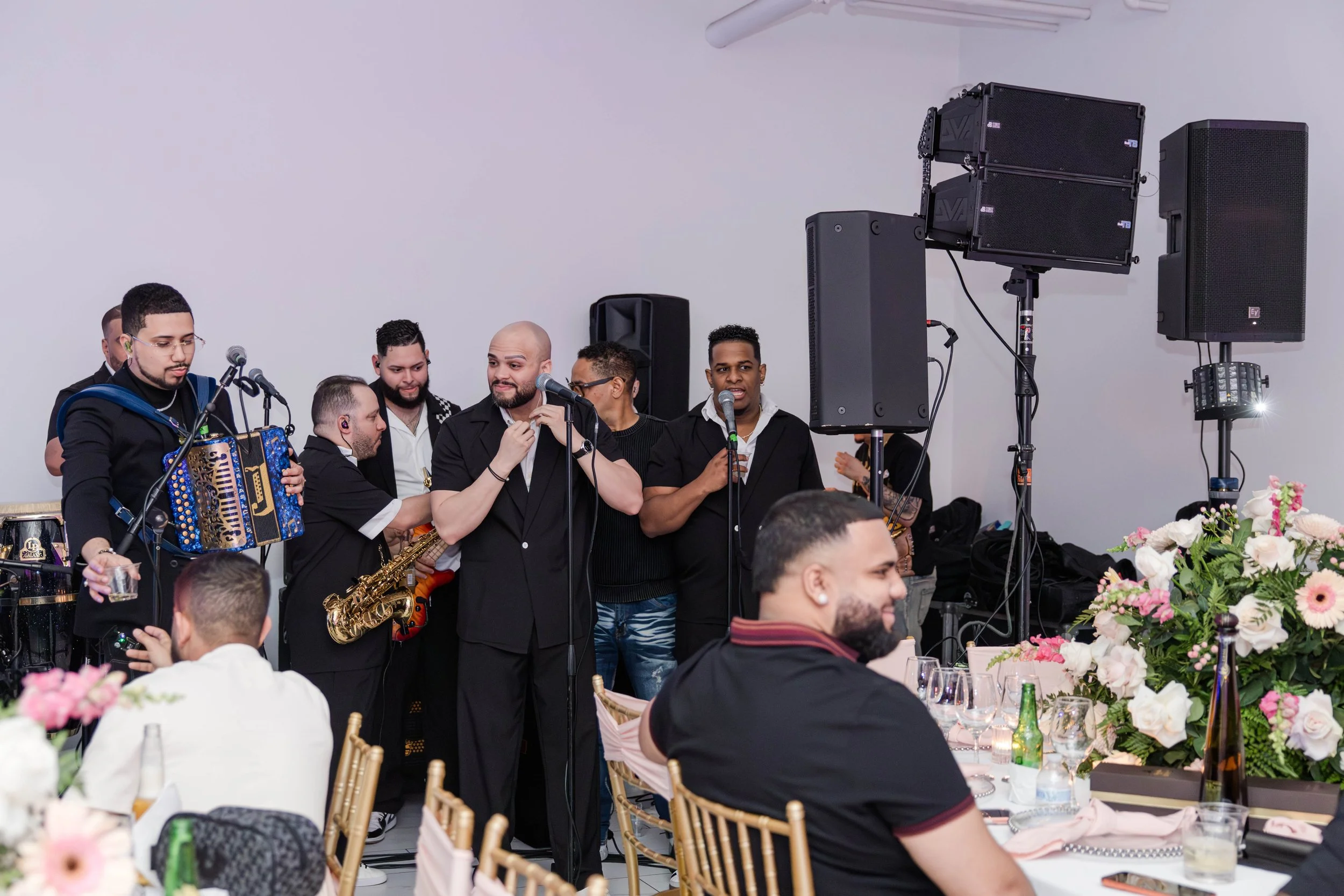 Live merengue típico band performing at a graduation party in Freeport NY, photographed by Moon & Stars Photography Long Island event photographer.