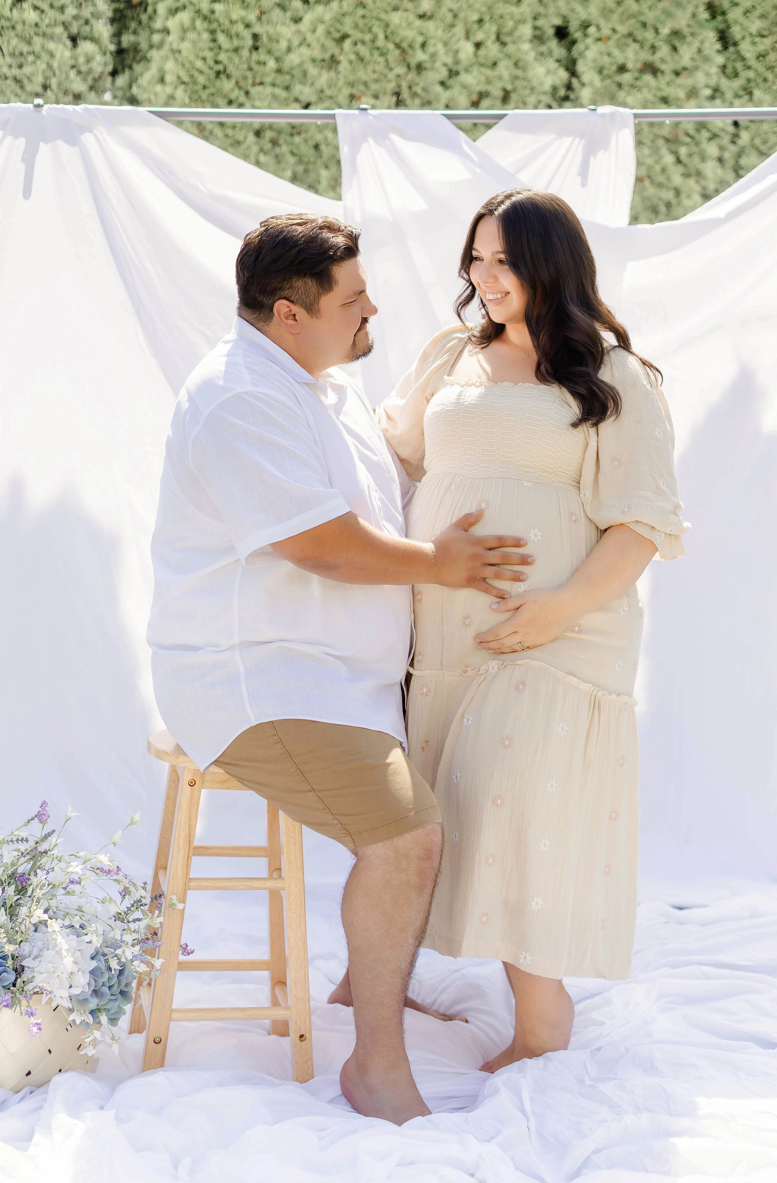 floral-park-ny-maternity-session-couple-holding-hands.jpg