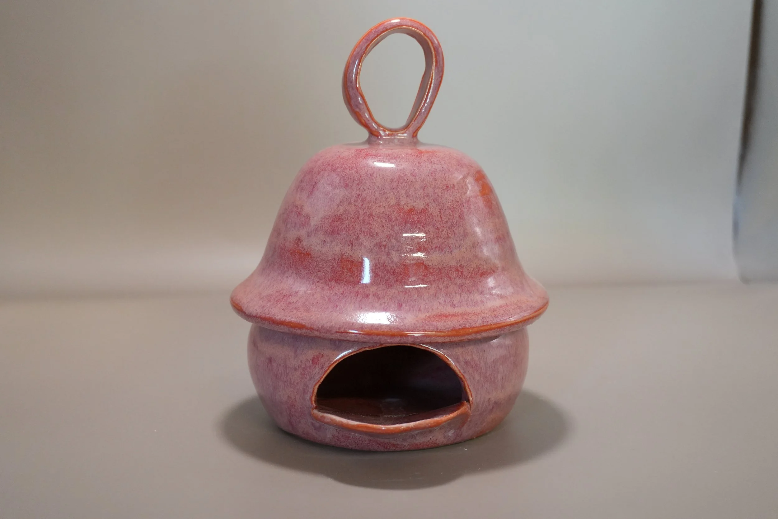 Handcrafted Ceramic Birdhouse with Pink Glaze