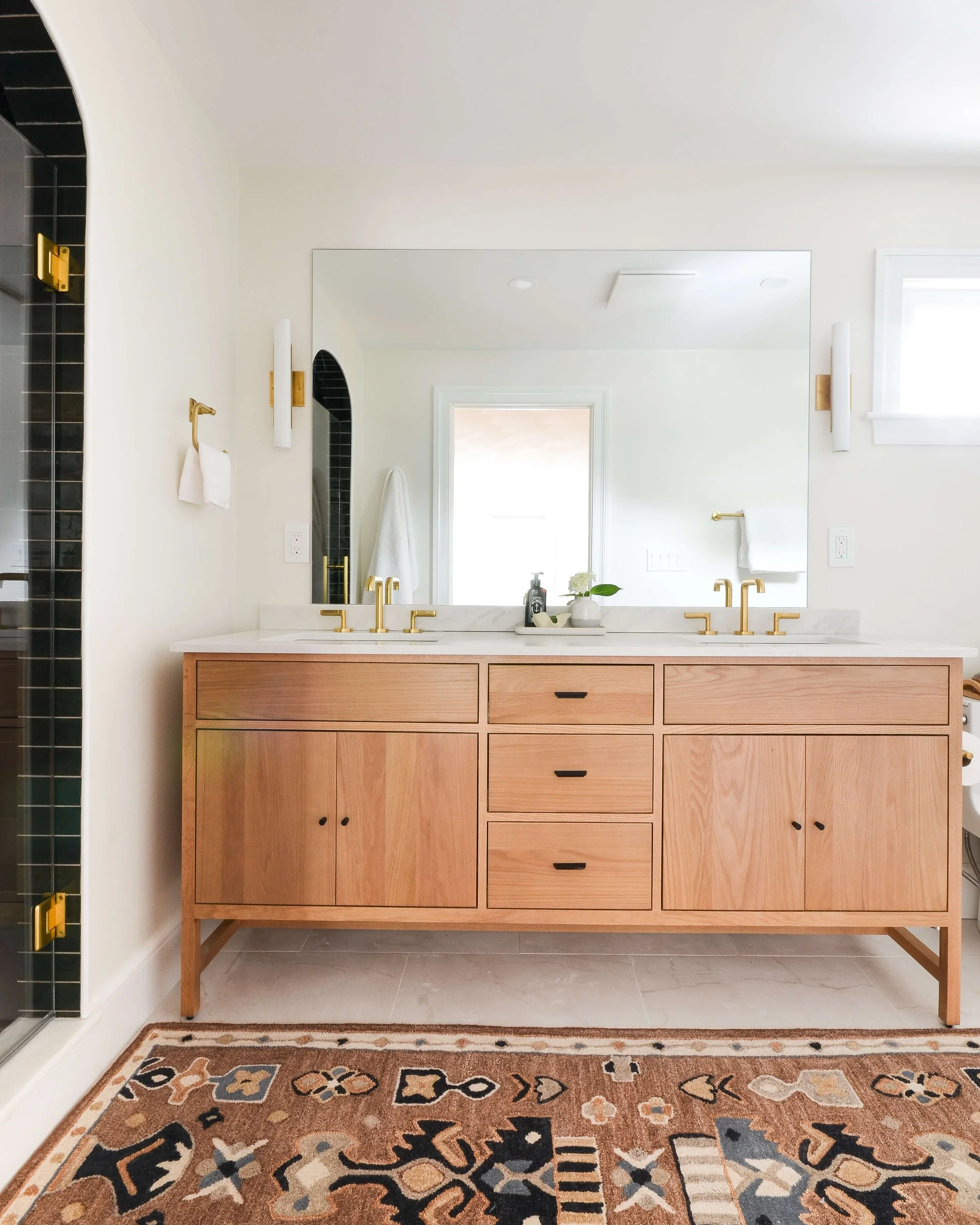 A small footprint, made to feel airy, bright, and clean. Smart choices, not extra square footage, do the work.