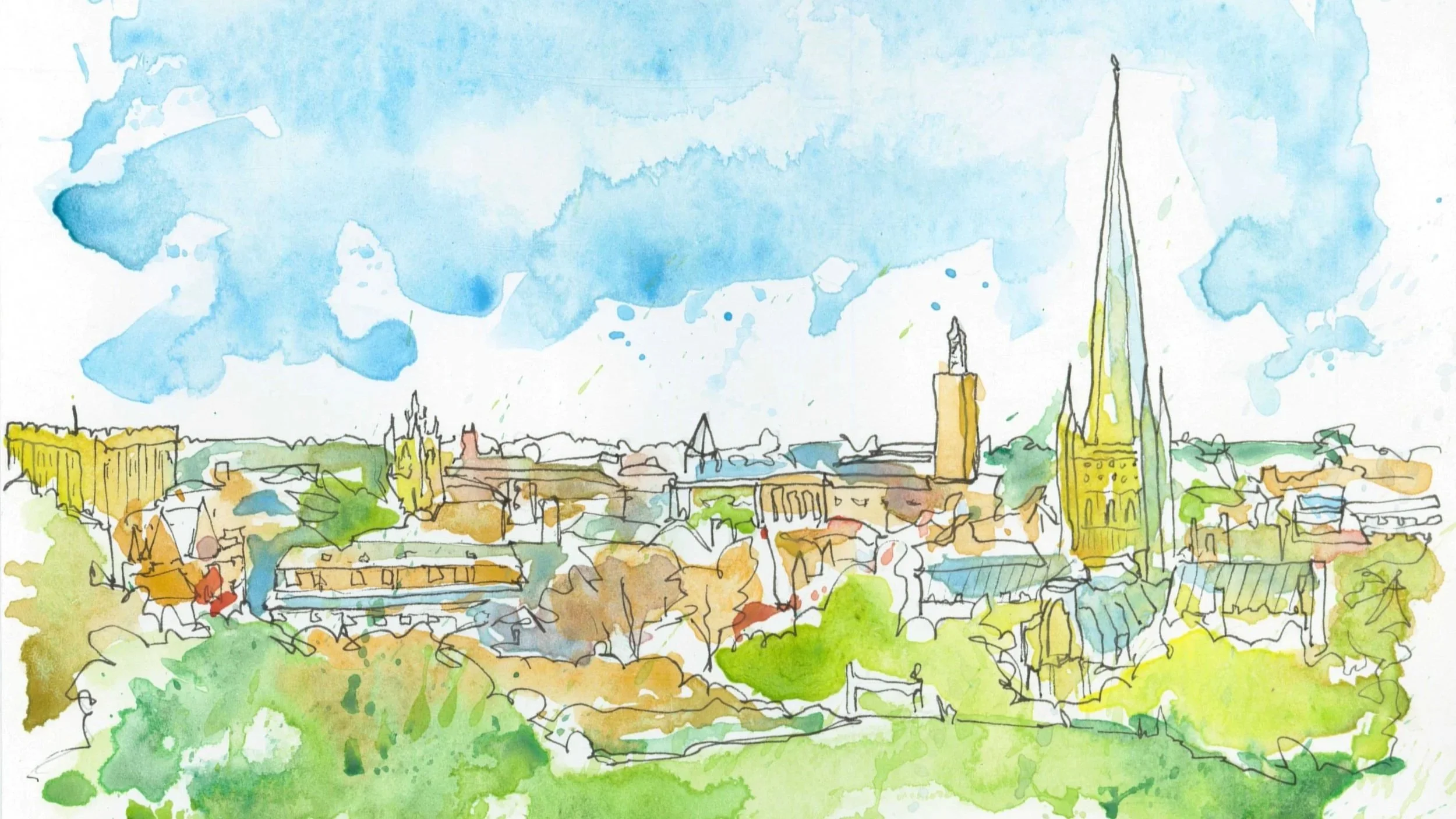 A watercolour painting of a city skyline with prominent church spires and a large building, under a partly cloudy blue sky with scattered clouds. Featuring Norwich Cathedral and Skyline from Mousehold Health.