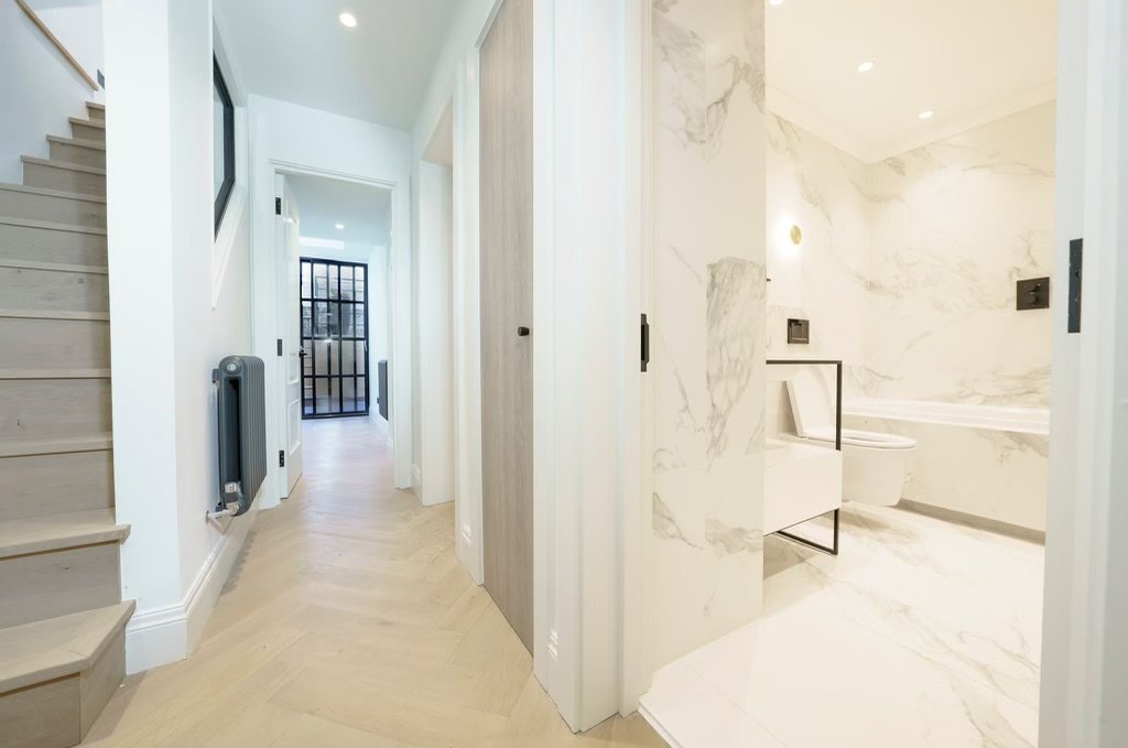 Renovated Notting Hill home with oak staircase, herringbone flooring, new internal doors and Crittall doors