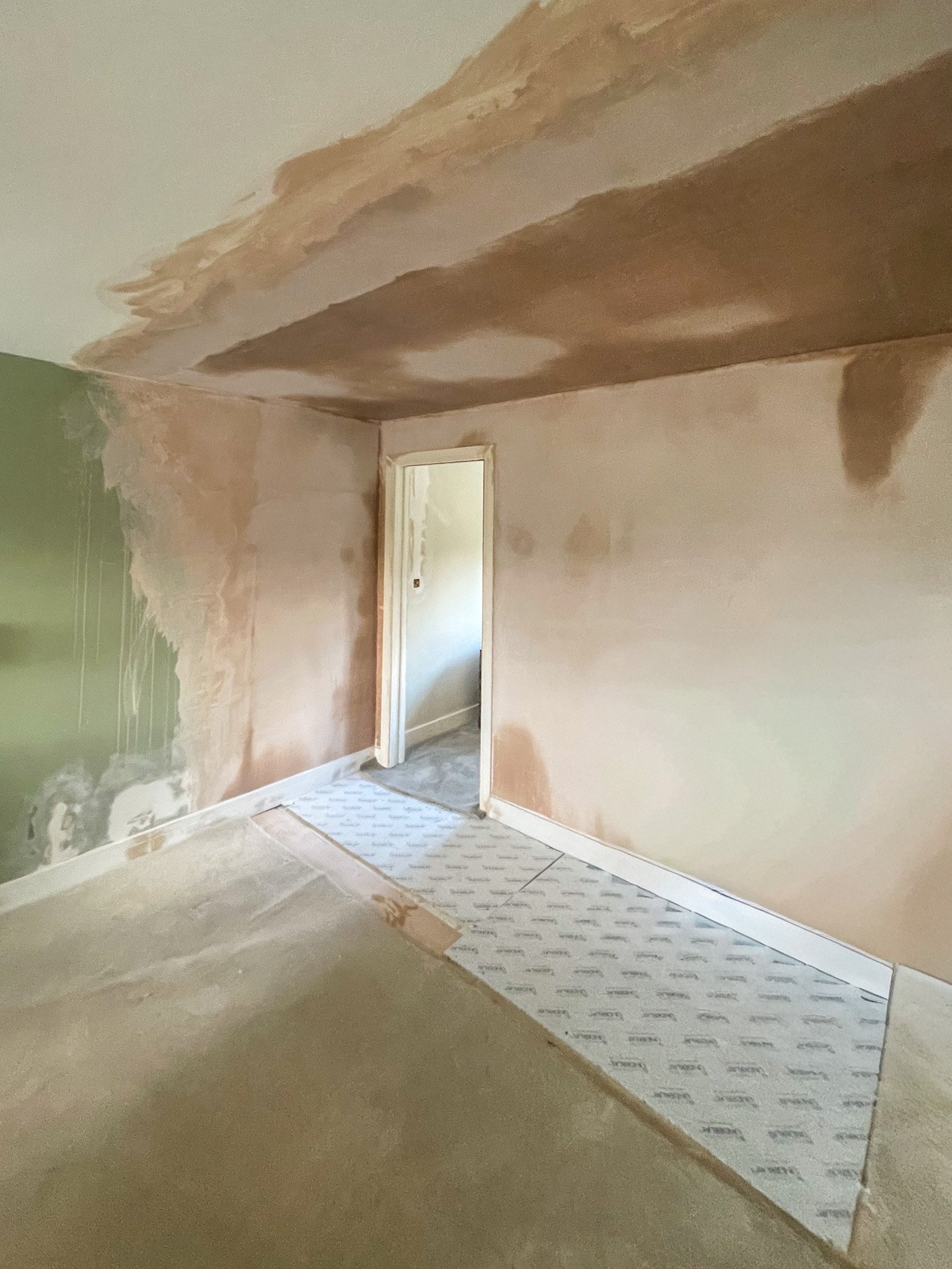 Completed internal alteration with pocket door, plastered walls, skirting and architrave