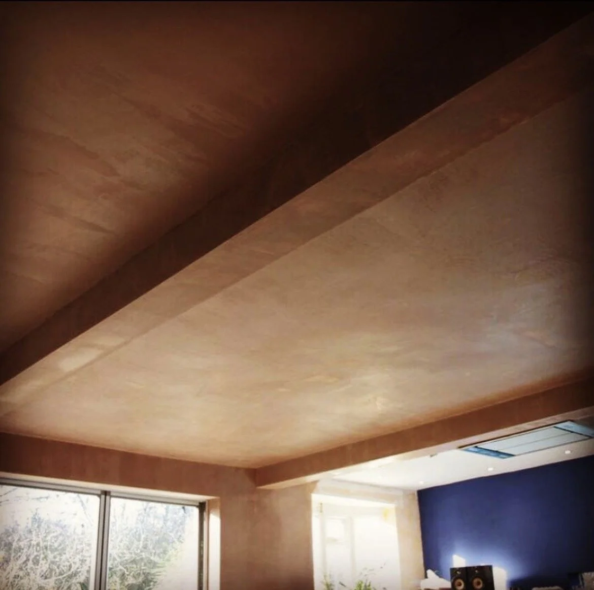Plastered ceiling with boarded and skimmed structural steel beams