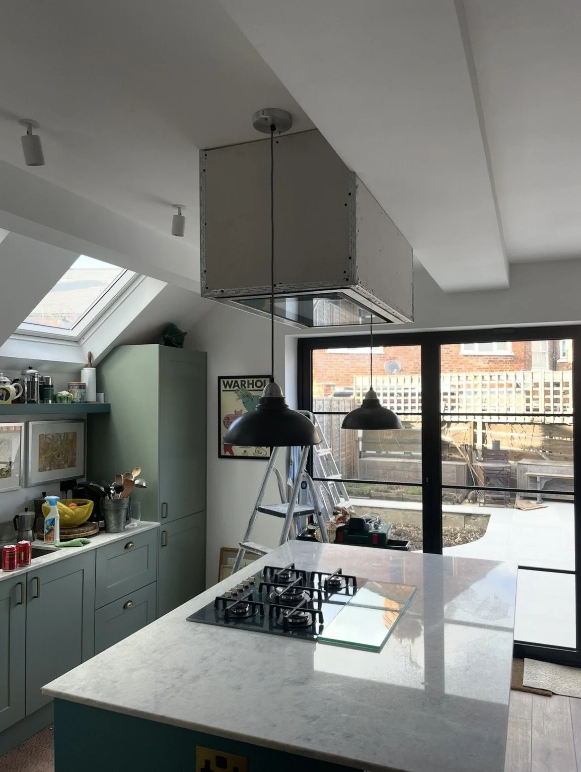 Completed open-plan kitchen and living space after structural alterations