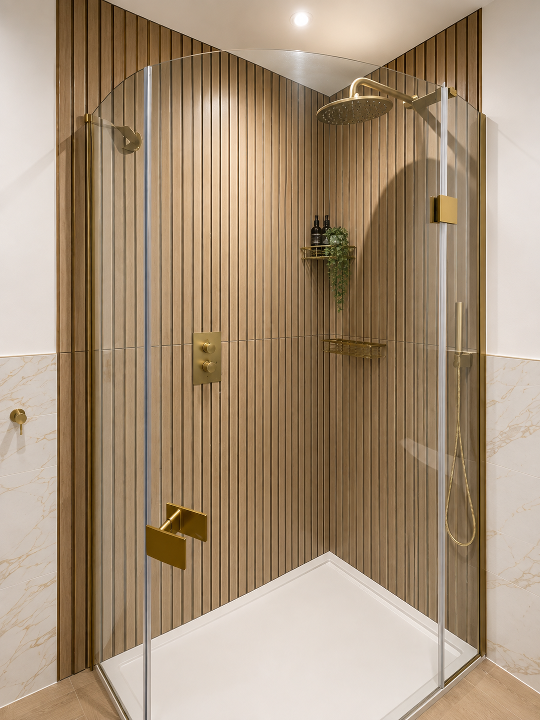 Shrewsbury bathroom with offset quadrant shower, Scandi-style slatted wood-effect tiles, marble-effect tiling, brass fittings and concealed overhead shower